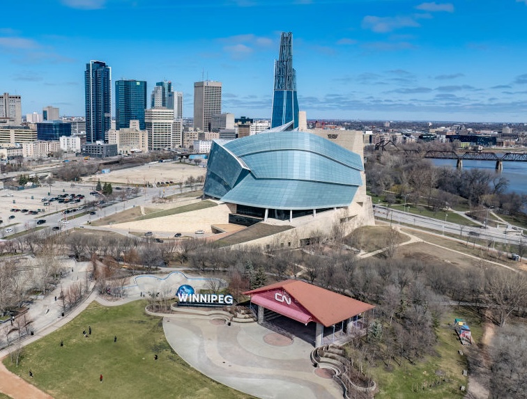 Canadian Museum of Human Rights Facing Legal Threat Over Nakba Show An aerial view of a cityscape.
