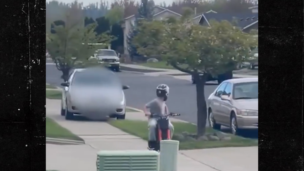Car Pursues Bike-Riding Kid on Sidewalk in Alarming Video, Woman Arrested for DUI Car Pursues Bike-Riding Kid on Sidewalk in Alarming Video, Woman Arrested for DUI