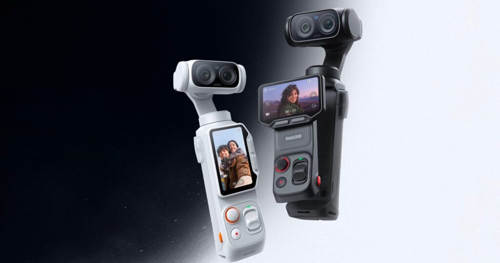 Two handheld 3D cameras, one white and one black, each with a touchscreen displaying selfies, stand side by side against a gradient black-to-white background. Both have dual lenses and control buttons.