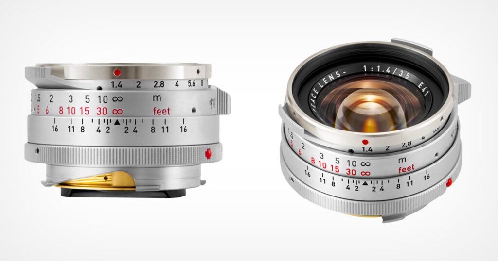 There’s Yet Another Leica-Inspired 35mm Lens on the Market Two views of a silver camera lens with engraved distance and aperture markings; the left shows the side, the right shows the front with visible glass elements and "LEITZ LENS 1:1.4/35" text around the rim.