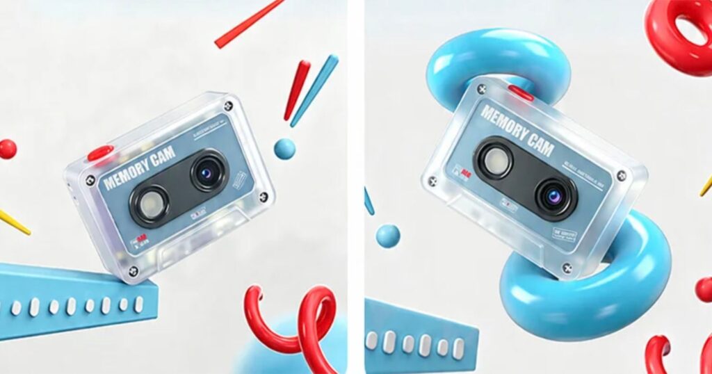 This $55 Toy Camera Looks Like a Cassette Tape for Some Reason Two views of a translucent, cassette-shaped camera labeled "MEMORY CAM" floating amidst abstract 3D shapes like rings and rods.