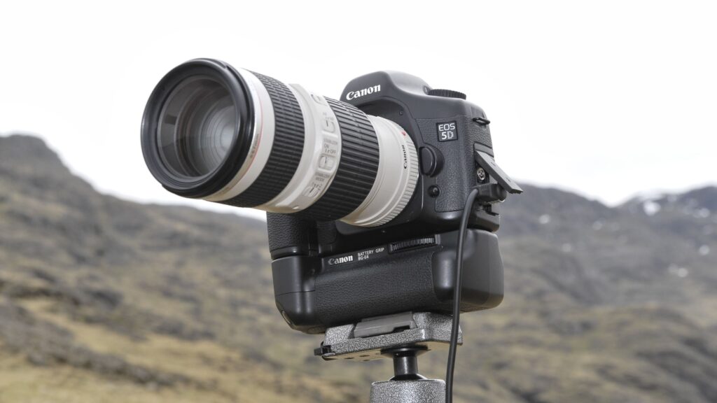 Photographers are vibe coding 20-year-old DSLR cameras to look and shoot more like film